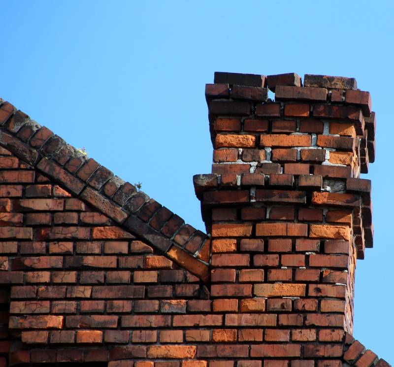 Signs Your Bedford Park Home Needs a Chimney Inspection Damaged chimney on an Bedford Park home showing cracks and missing mortar
